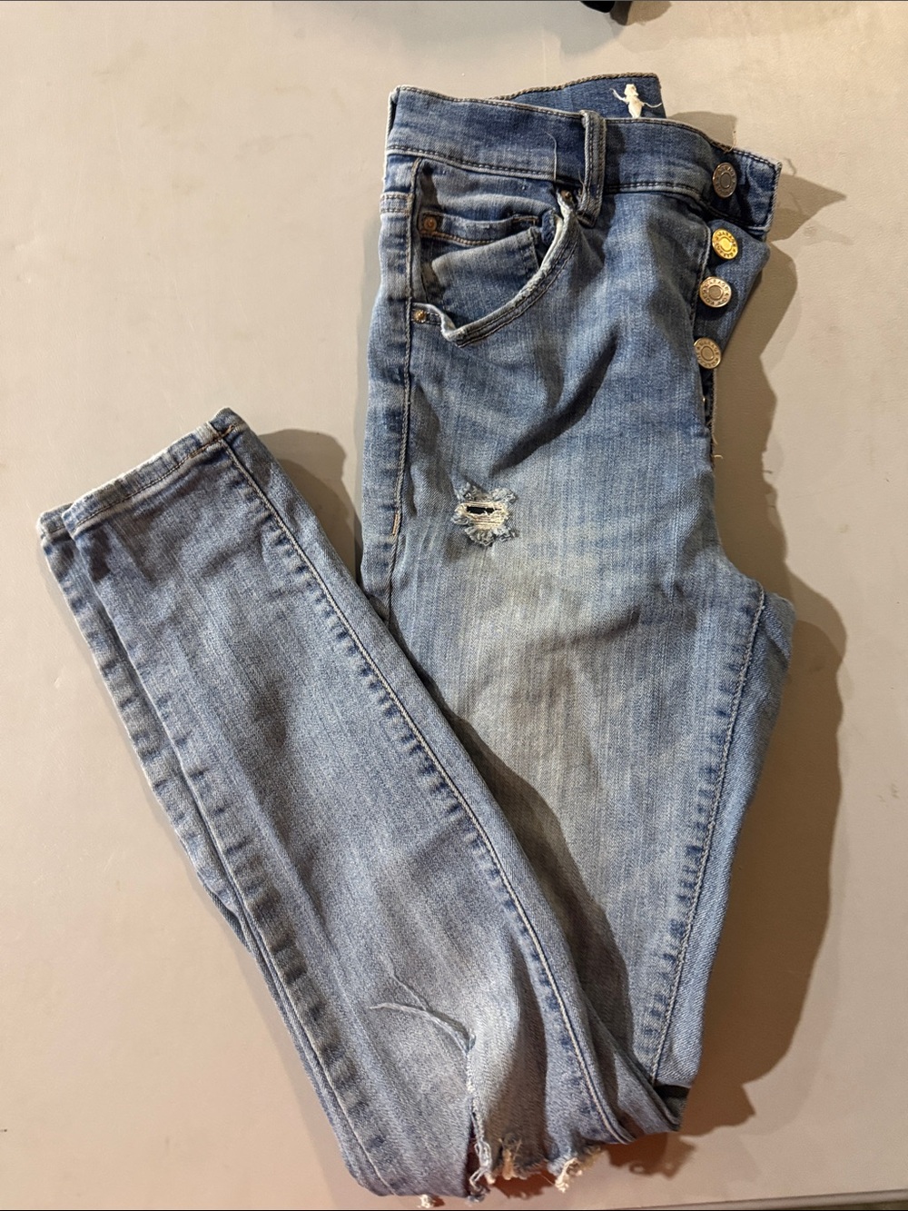 Garage Light Wash Distressed Skinny Jeans with Button Fly